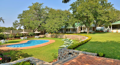 Pool area and gardens, Batonka Guest Lodge, Victoria Falls