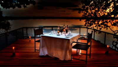 Private dining overlooking the lagoon at Xugana Island Lodge, Botswana