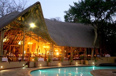 View of dining area from the pool at Chobe Safari Lodge