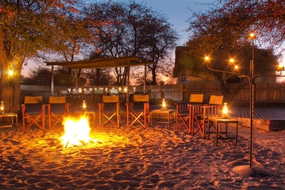 The camp fire at night at Deception Valley Lodge, Kalahari, Botswana