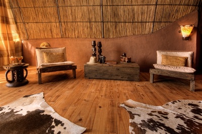 Camp Okuti lounge area in guest chalet