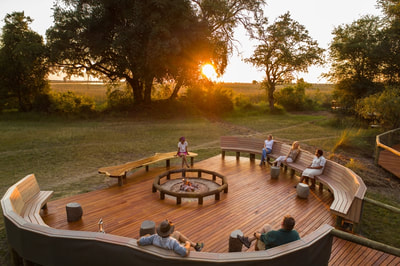 Fire pit at Camp Moremi at sunset
