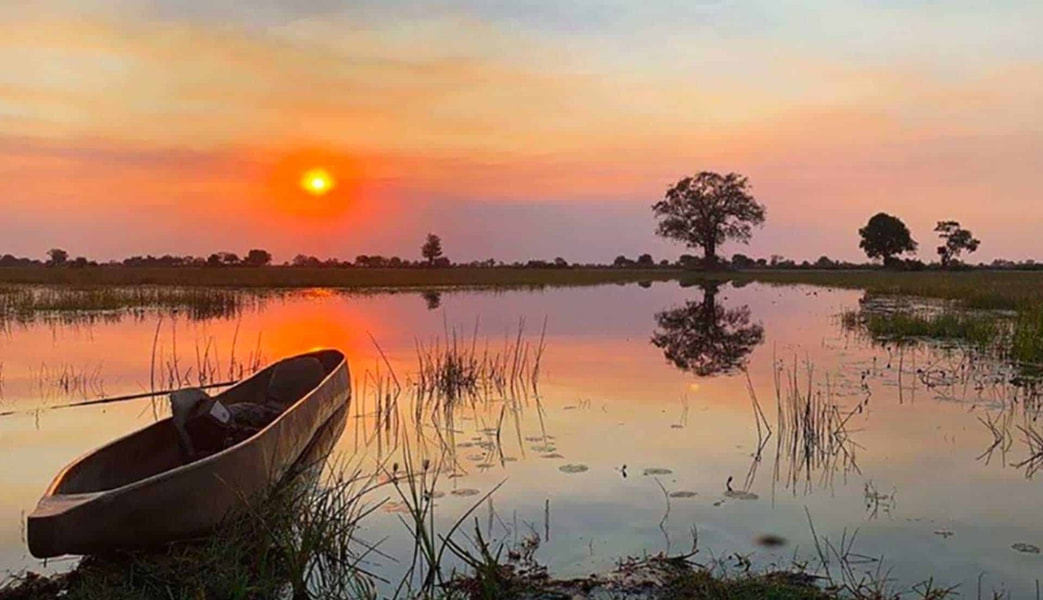 Mokoro at sunrise, Jumbo Junction Camp, Okavango delta