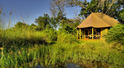 Tented accommodation exterior at Kanana Camp, Okavango Delta