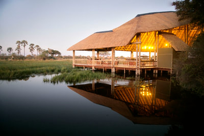 Main lodge area and lagoon at Moremi Crossing Camp, Botswana