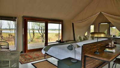 Standard tent interior at Nogatsaa Pans Lodge