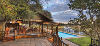 Lounge and pool area at Savute Elephant Lodge, Botswana