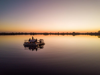 Private dinner on the lagoon at Xugana Lodge, Okavango Delta